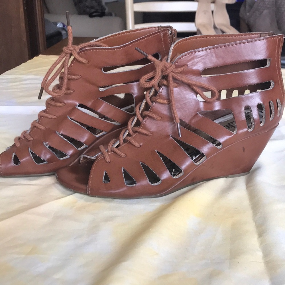 Faux leather, with cut outs/lace up wedges